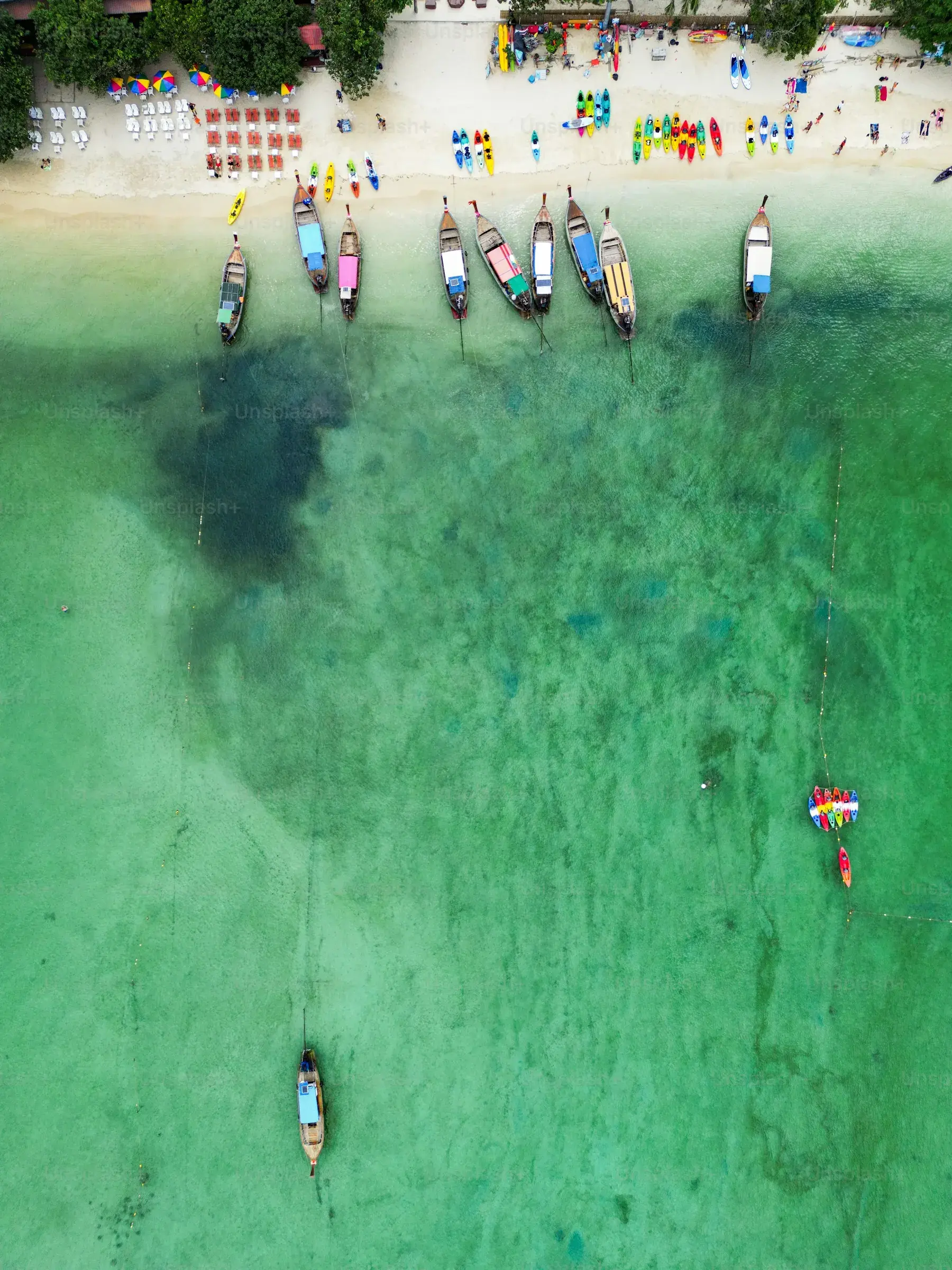A fishing boat crossing the green water off Cox's Bazar