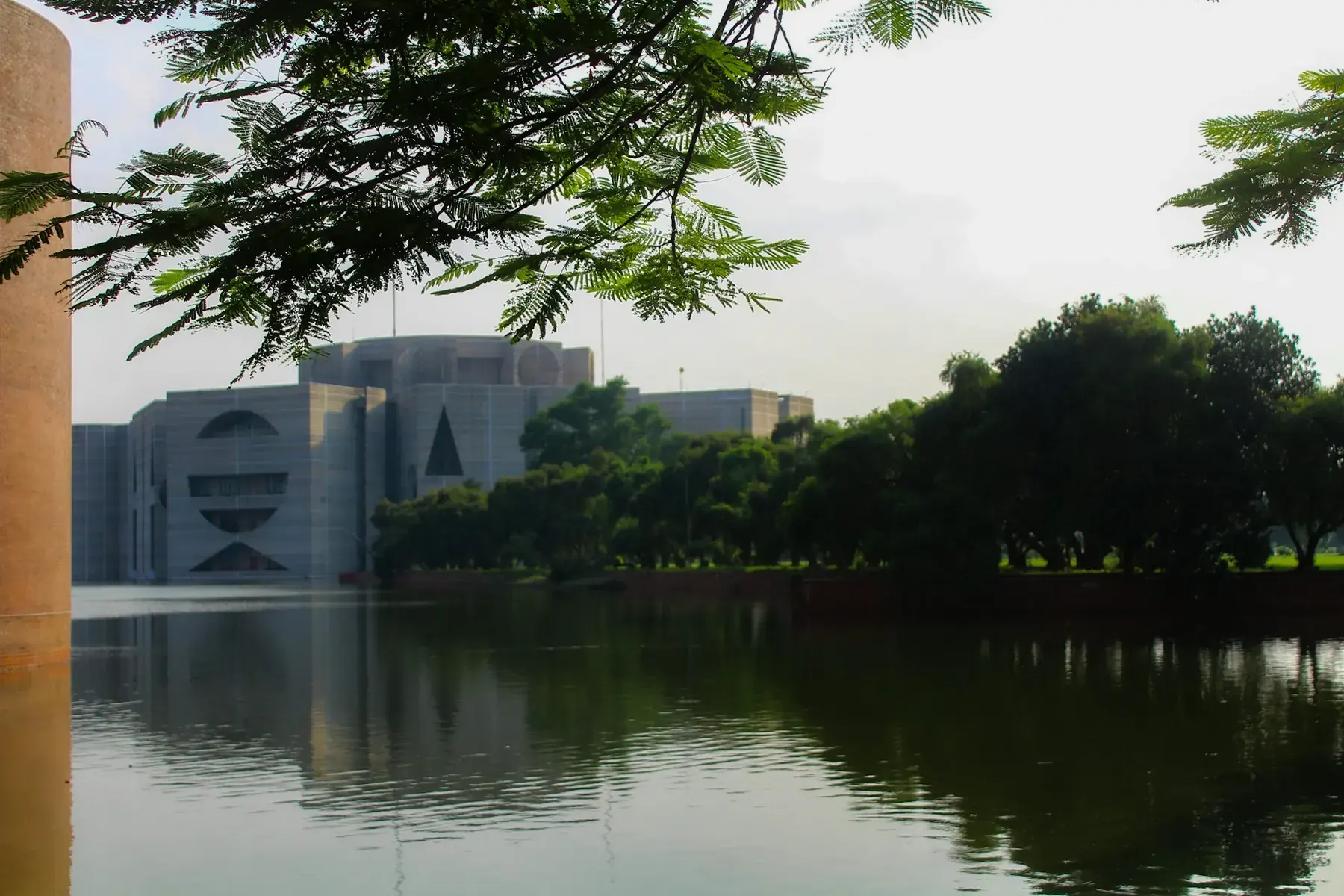 Modern civic architecture reflected in water