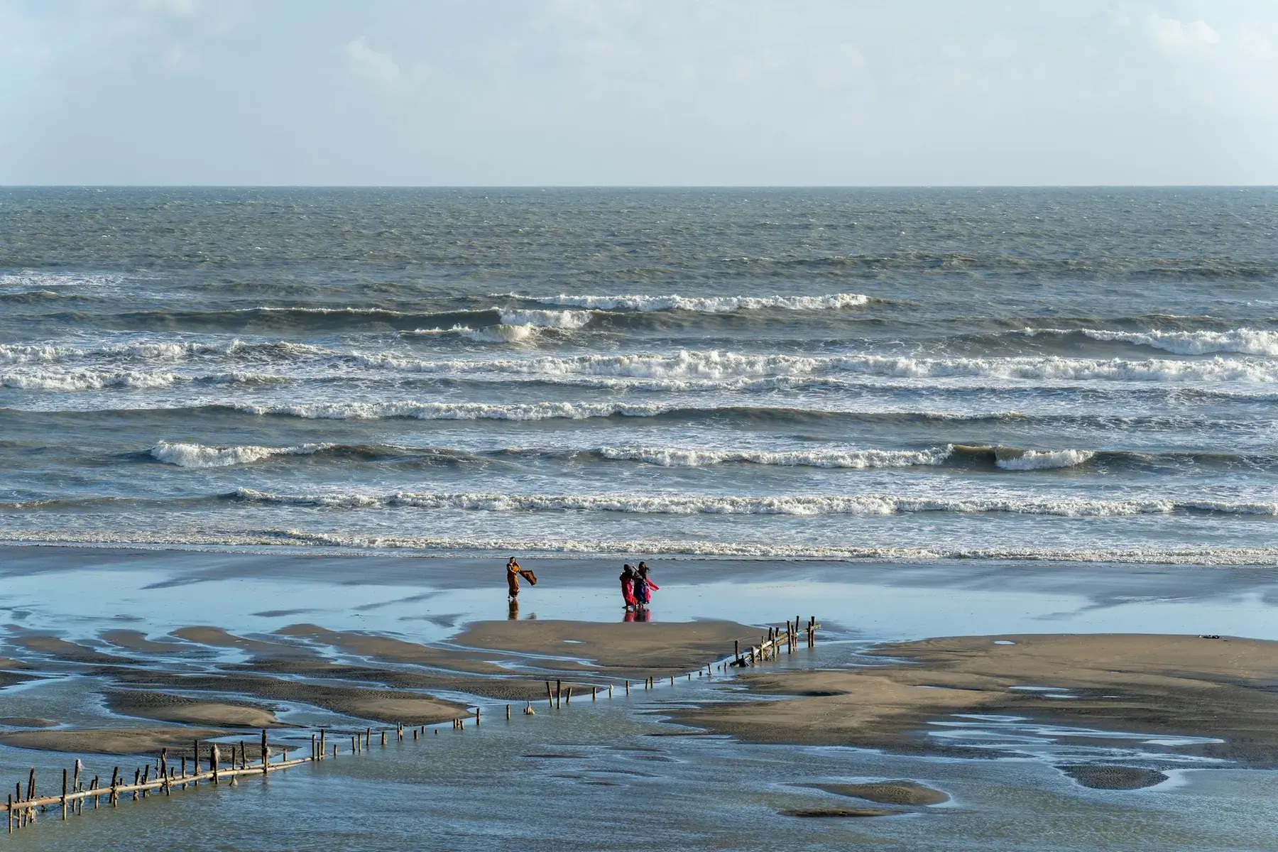 The broad tidal beach beside the Cox's Bazar coast
