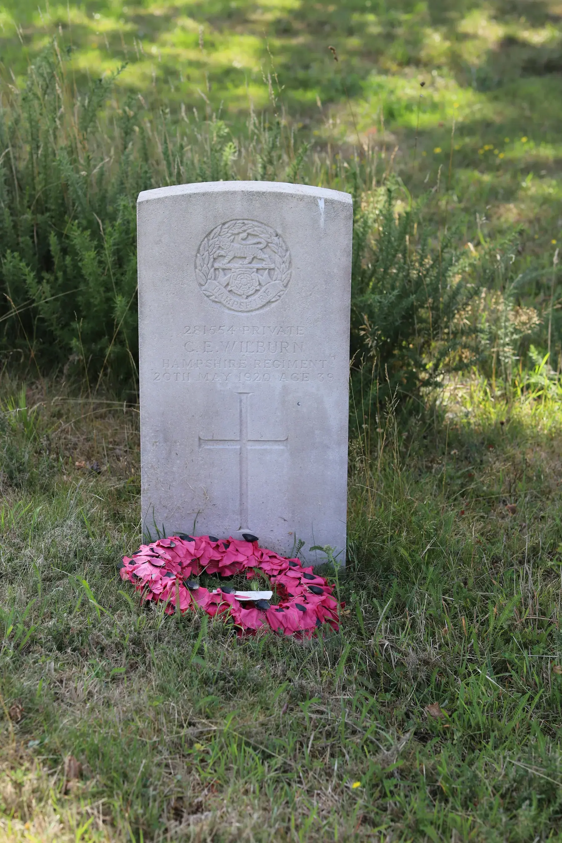 A Commonwealth headstone marked by a remembrance wreath